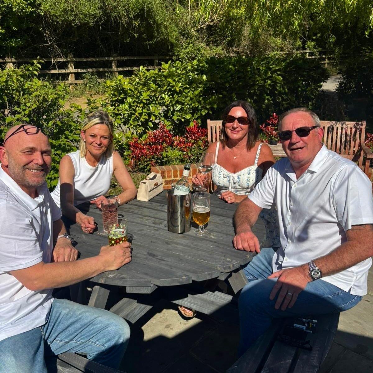 A table in the garden at The Yew Tree, Maidstone
